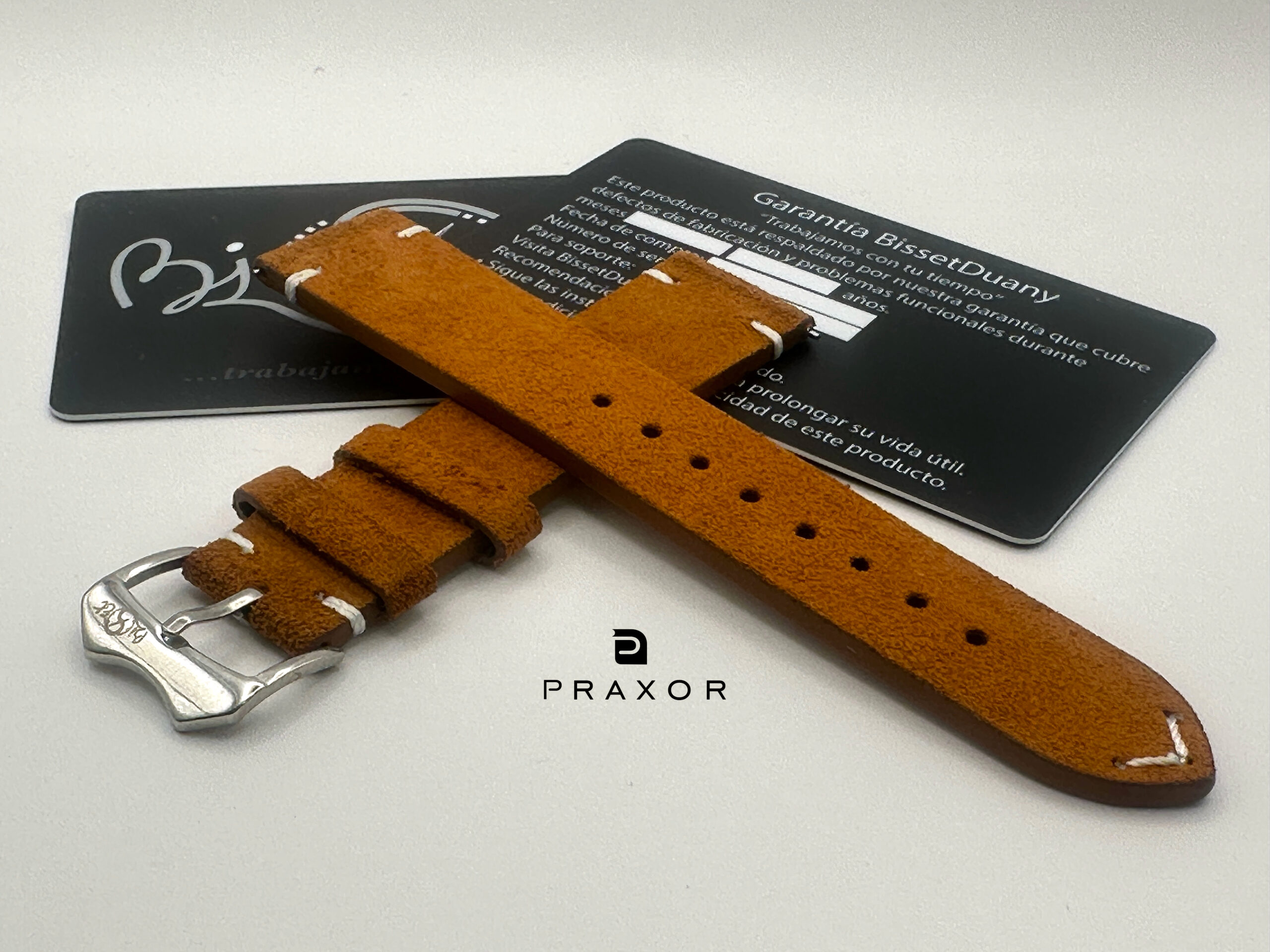 Praxor suede strap with BissetDuany guarantee card.