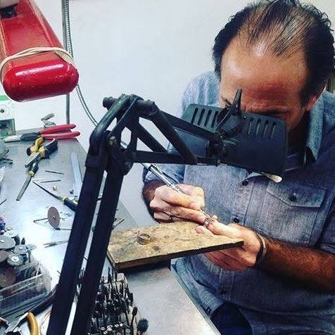 Jorge Gil working at the bench