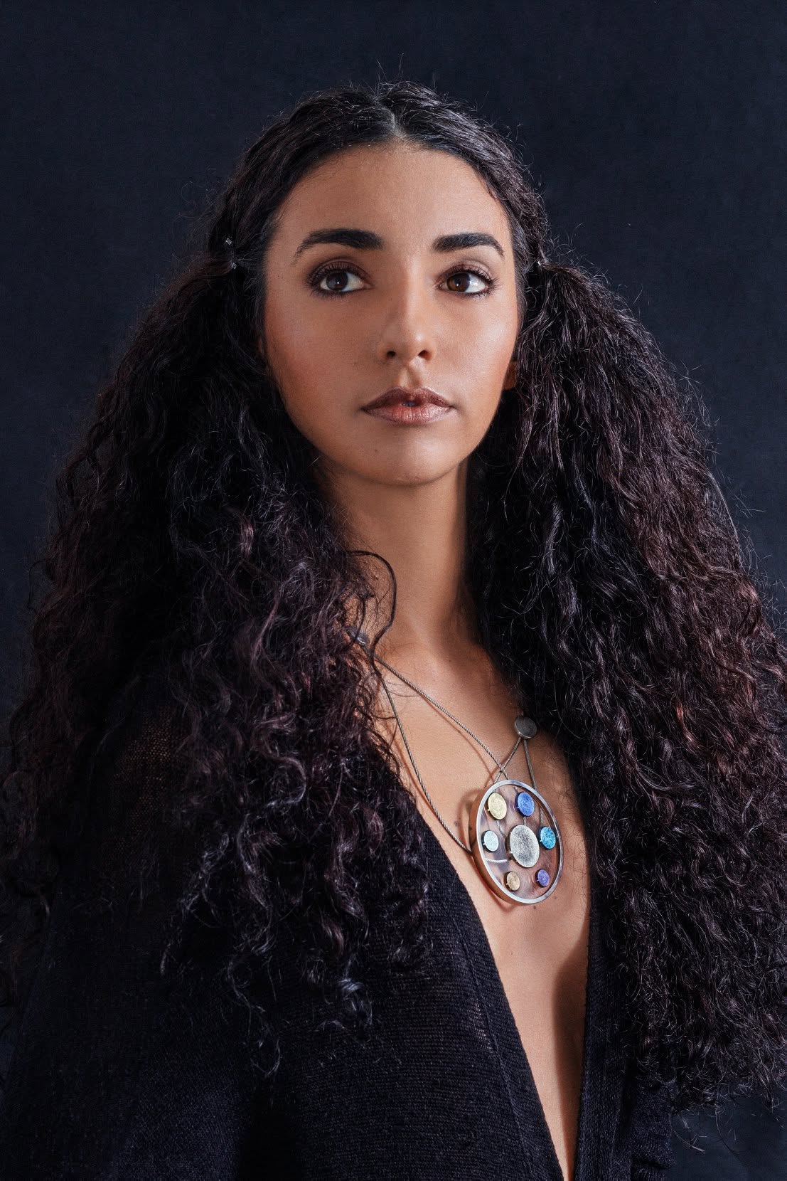 Titanium jewelry by Jorge Gil on model